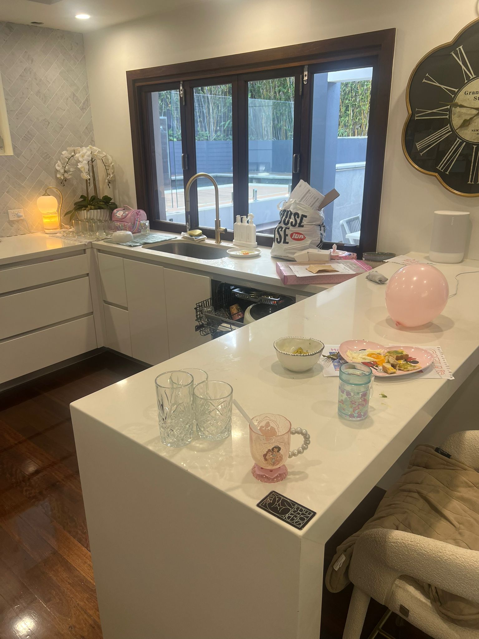 Cluttered kitchen before a Care for a Clean service