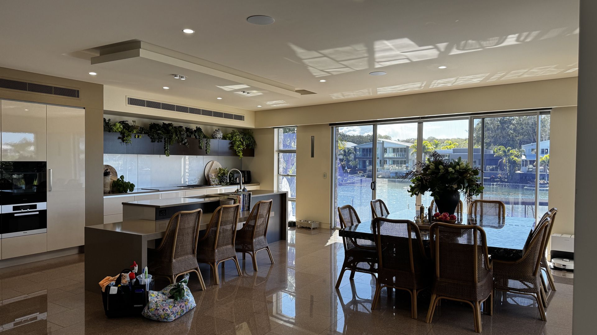 An open-plan kitchen, dining and living area cleaned end to end